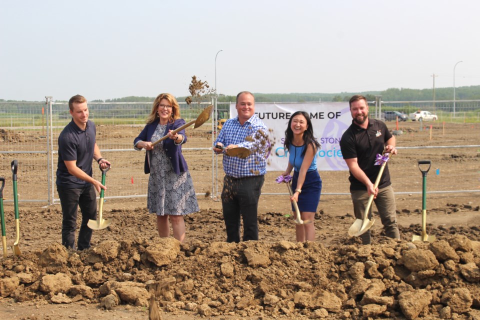 Groundbreaking ceremony for Stepping Stones Crisis Society's new net-zero women's shelter facility was held on July 19, 2023. Pictured: Coltan Buchta Nails Enterprise program manager, Susan White, the SSCS executive director, Matt Brown, the VP of Nails Enterprises, Cindy Yang, SSCS director of strategic priorities, and Alan Lamontagne president of Nails Enterprise.