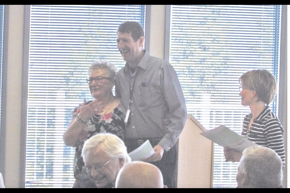 Stella Scott and former Lac La Biche County Mayor Omer Moghrabi during a 2018 Volunteer Appreciation luncheon where Stella was presented with a certificate to recognize her work with the Lac La Biche Disability Services.