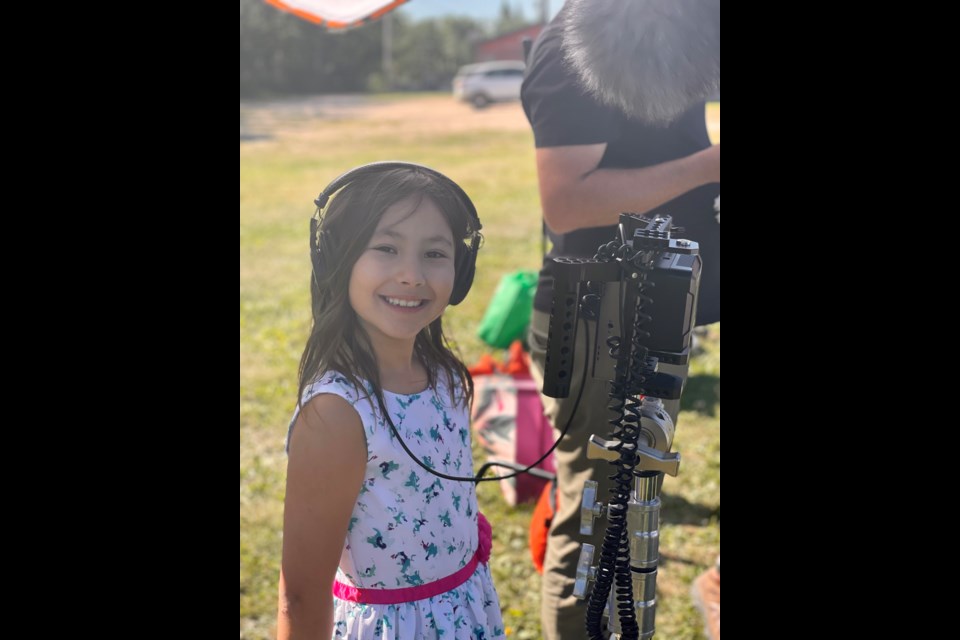 Amelia Hardy behind the camera while filming the short film Kikino Kids.