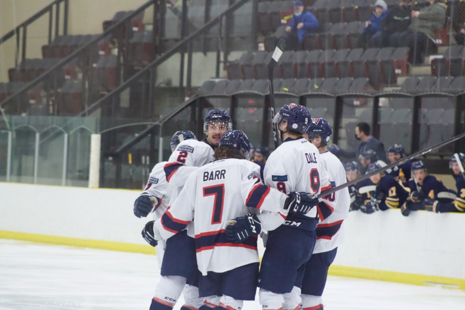 Portage players celebrate a goal at a recent home game. The team is on a by-week before playing the Briercrest Clippers on Nov. 25 and 26 in away games. Wins that weekend could catapult the Voyageurs up the ACAC standings.    POST-file  image