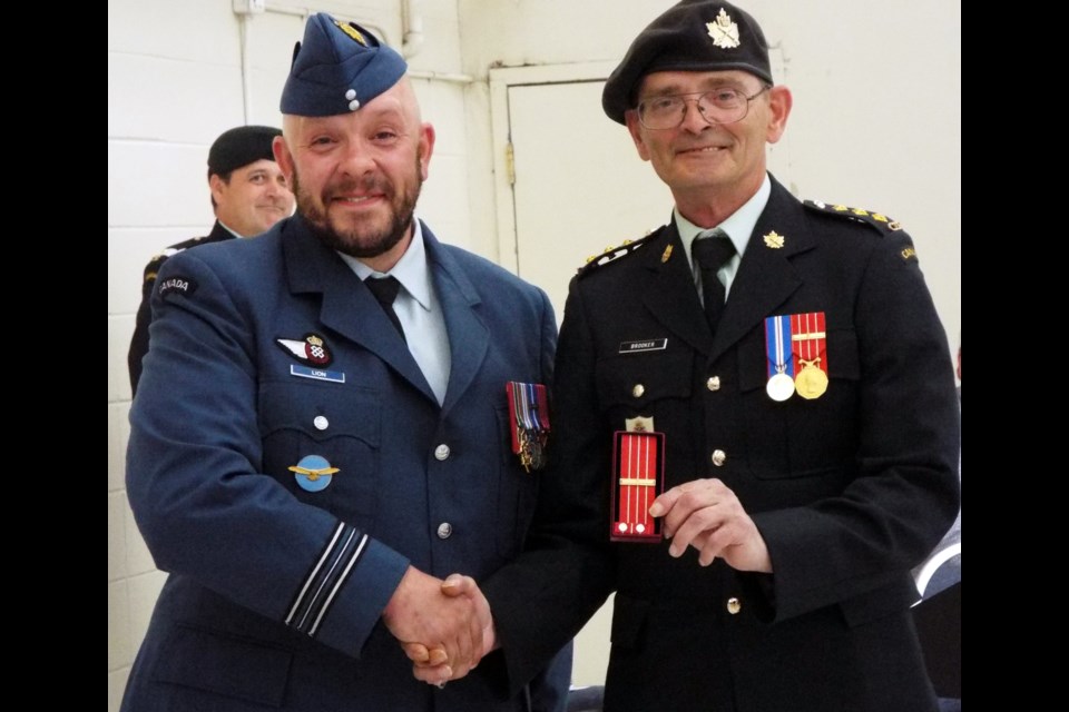 Capt. John Brooker also received an award at the Annual Ceremonial Review, with Major John Lion presenting him with the Second Clasp to the Canadian Forces Decoration, signifying his years of service.