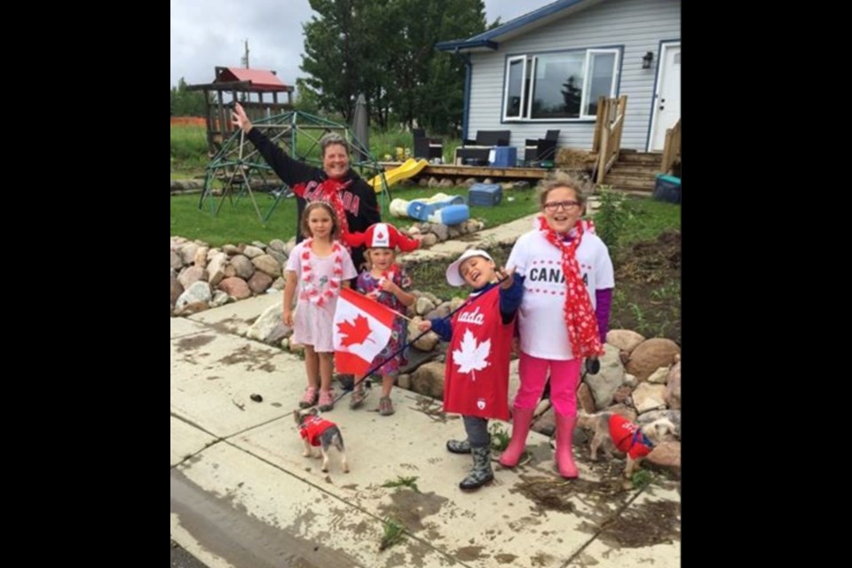  Karen Mauro with neighbourhood kids - Talia and Isabel Pruden, and her grandchildren Joseph and Arianna Morin.