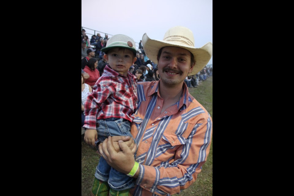 Rodeo fans: Lac La Biche's Quinten Moench and his son, Palmer were enjoying the Lakeland Country Rodeo over the weekend.
