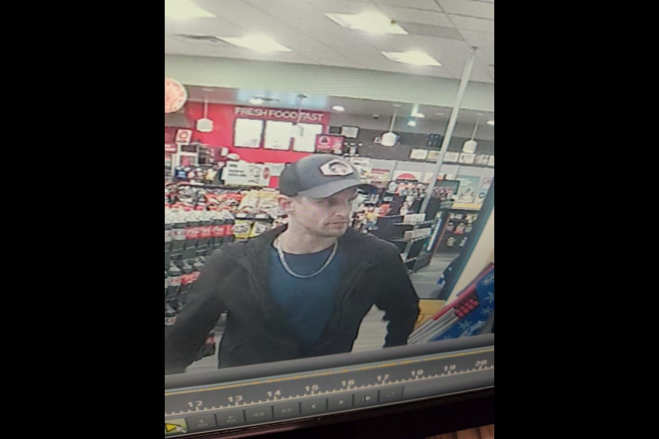 Police say this is an image of a person suspected to be involved in a vehicle theft .