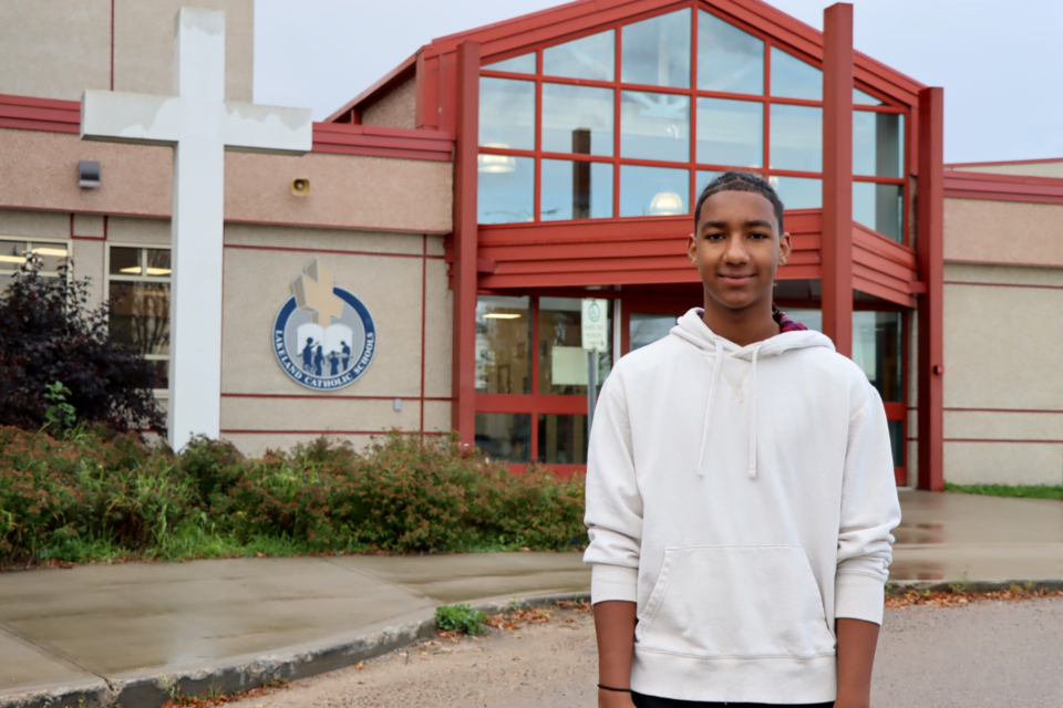 Corbin Williams is pictured at his school, Assumption Jr/Sr High School in Cold Lake.