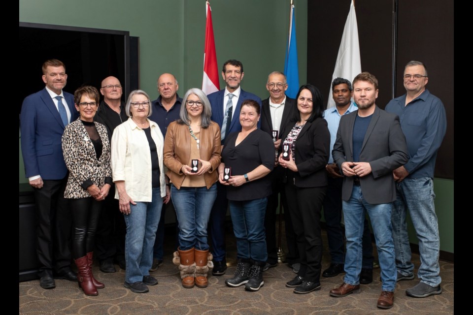 Lac La Biche County council members and MLA Brian Jean (left) surround recipients of Queen Elizabeth II's Platinum Jubilee Medals. The awards were presented to Gail Broadbent, Dave Phillips, Omer Moghrabi, Donna Webster, Rene Schuab, Doris Burdek (Debbie Burdek accepting) and Art Avery (not in attendance).