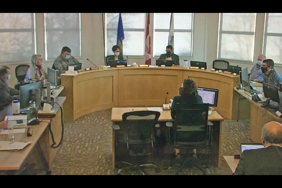 A screen grab of today's council meeting had almost all elected officials wearnign protective face masks. Councillor Darlene Beniuk isn't in favour of council telling residents to wear the masks.