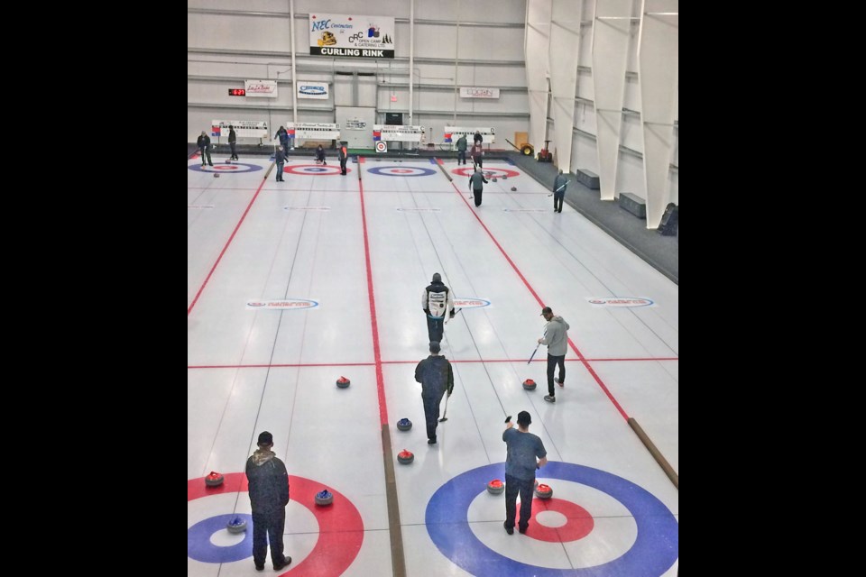 Curlers fill the Lac La Biche Curling Club ice sheets at the Bold Center for the 2022 Oilmen's Bonspiel.