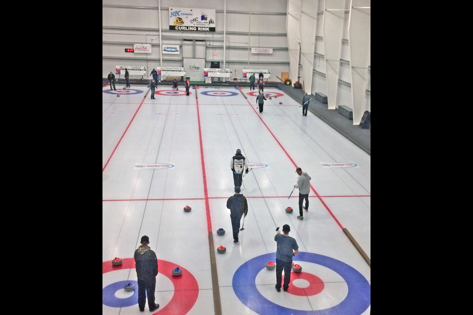 Curlers fill the Lac La Biche Curling Club ice sheets at the Bold Center for the 2022 Oilmen's Bonspiel.