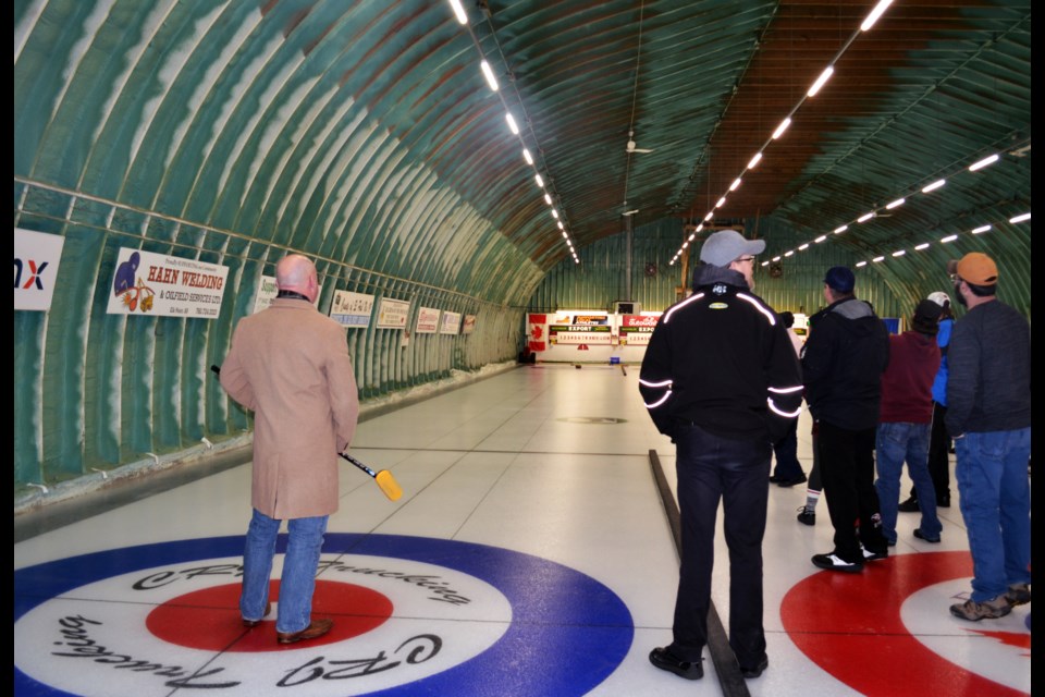 MLA David Hanson may not have curled for a while, but the “Break the Ice” rock he sent down Sheet 1 definitely made its way straight into the house, with the audience cheering its progress.