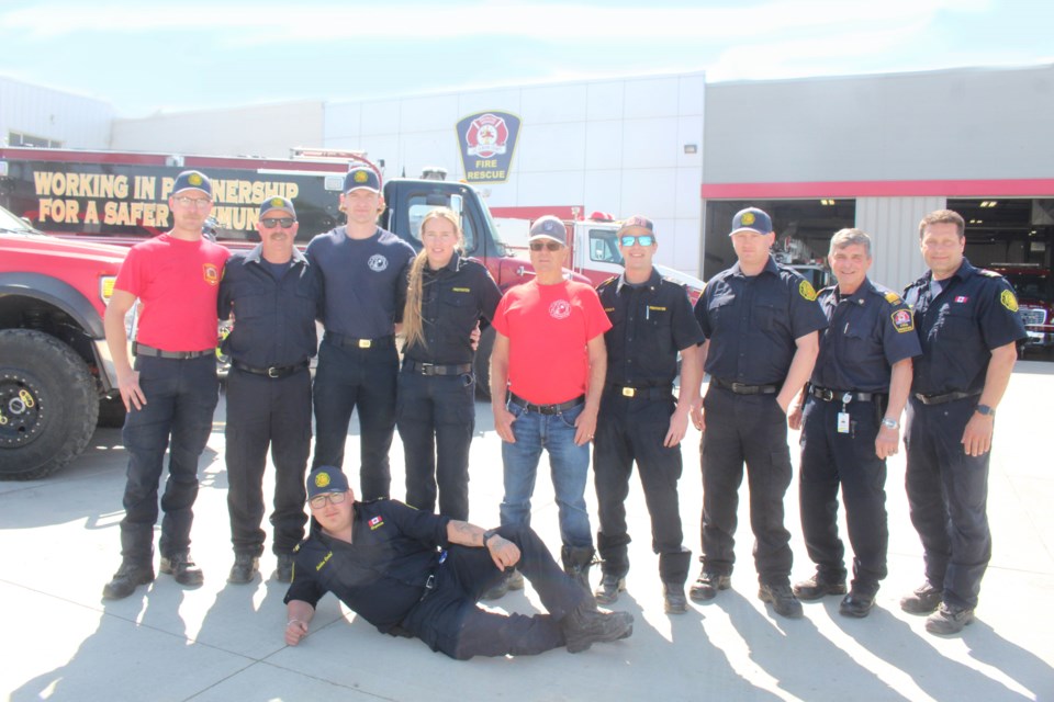 Cypress County and Diamond Valley firefighters with (far right) Lac La Biche County Regional Fire Chief John Kokotilo and task force leader Jim Fus.