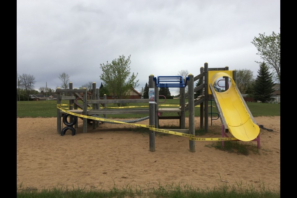 The playground at Desjardins Park in St. Paul can be seen with yellow caution tape, due to COVID-19. The playgrounds will be reopened once new signage is in place. Meredith Kerr photo