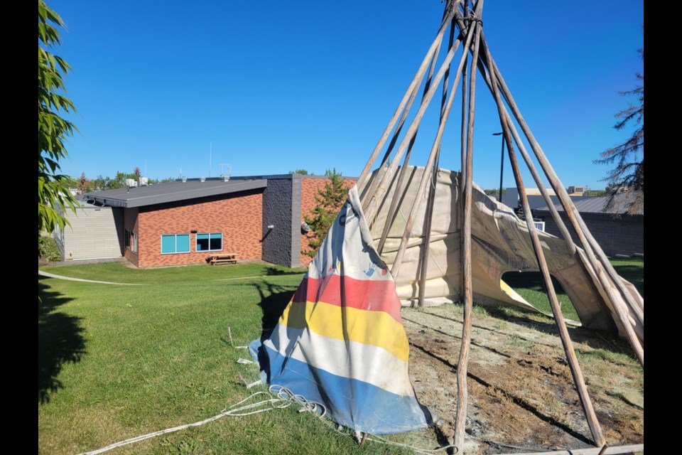 The damage to the ceremonial teepee that sits outside the Lac La Biche RCMP detachment.
