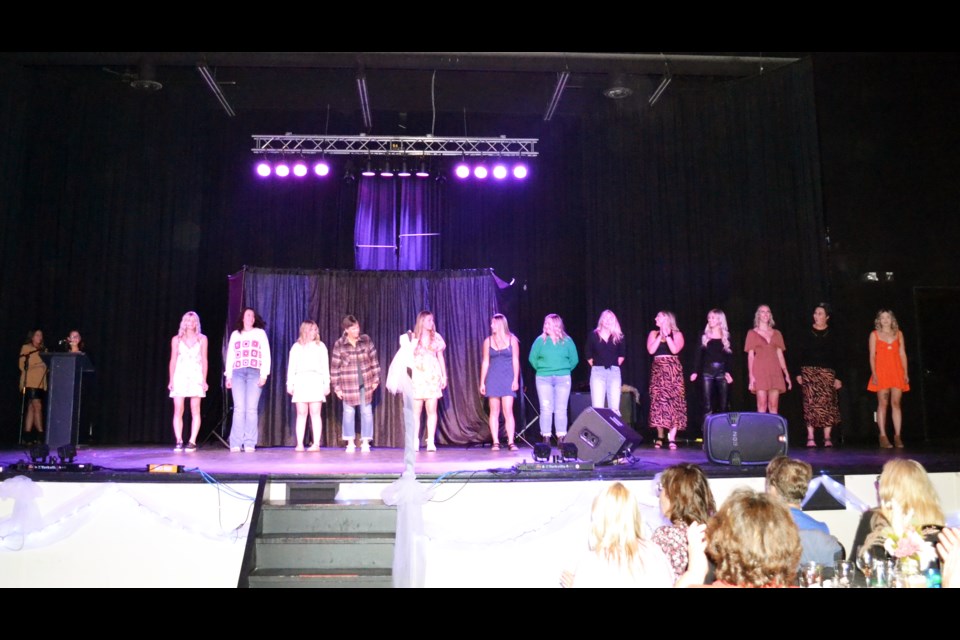 The lineup of 13 lovely ladies came on stage to take a final bow to wrap up the fashion show, which was narrated by Sherry Oszust.
