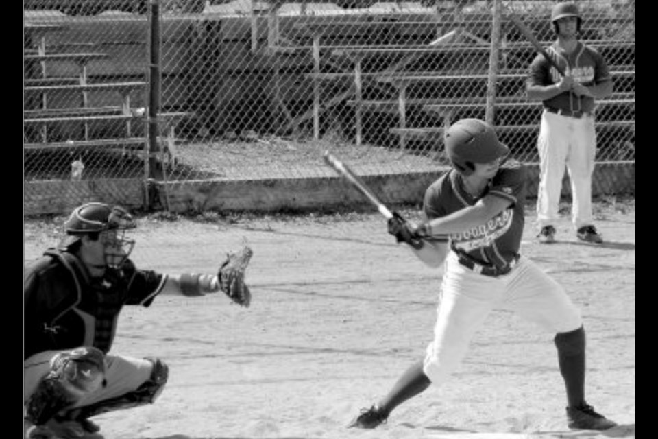 A Lac La Biche Dodgers player swings from the main diamond home plate in this undated image. Lac La Biche Mayor Omer Moghrabi, a one-time player and coach of the senior Dodger teams, says "Dodger Stadium" needs to stay in new updates for the downtown recreation grounds.   