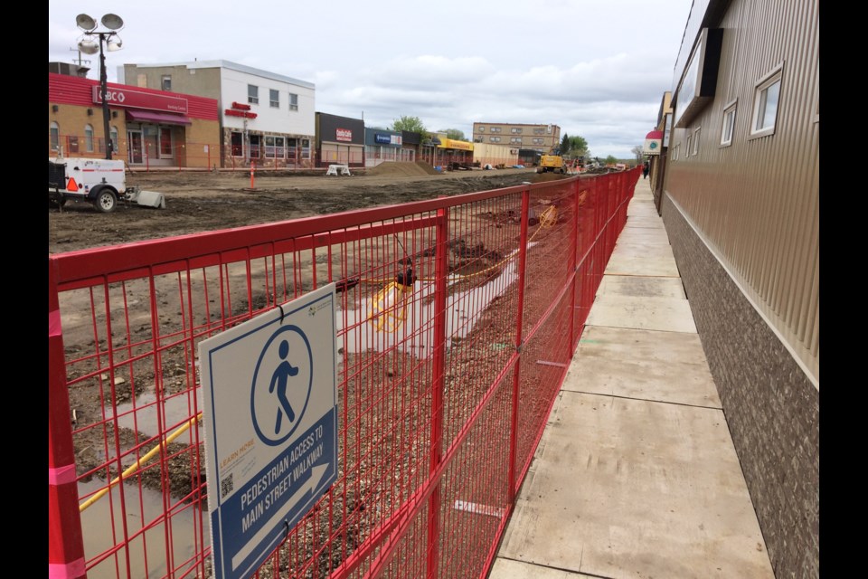 It was a little quiet in downtown Lac La Biche last week as wet weather sidelined construction work on the $37.5 million Main Street project, and shoppers weren't braving the wet temporary sidewalks.