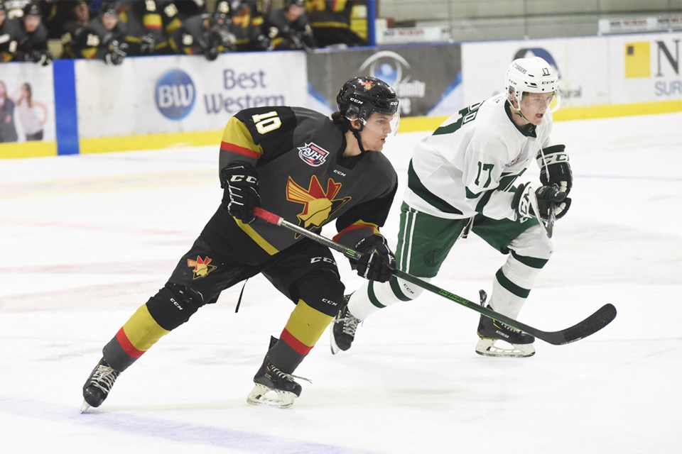 Bonnyville Pontiacs Ethan Sundar tries to out skate a member of the Sherwood Park Crusaders during their March 12 game, the first of eight the two teams will be playing against each other. Game Ready Photography photo. 