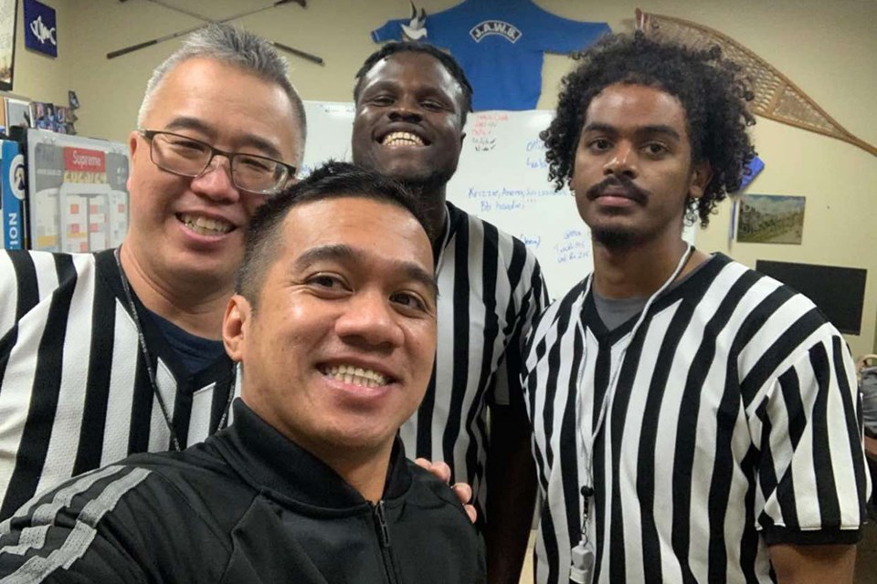 Edgar de Castro is bottom middle between three fellow referees.

Photo supplied by Edgar de Castro.