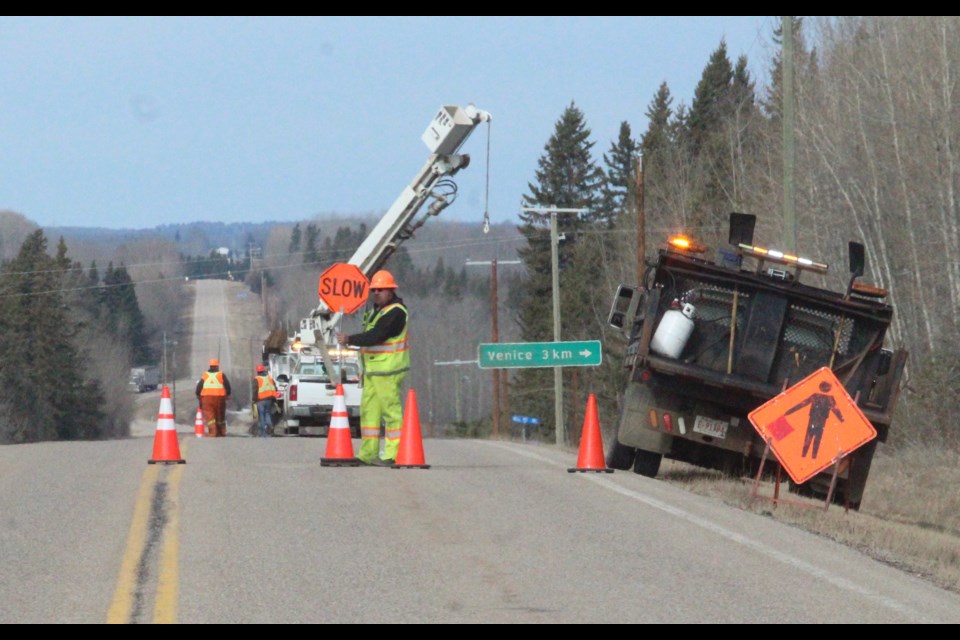 Emcon and utility crews at a construction area along Highway 663 near Venice last week. Fines for speeding in construction zones are double the standard fines.