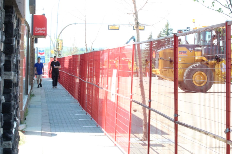 There isn't a lot of foot traffic along the Main Street sidewalks in the construction zone.