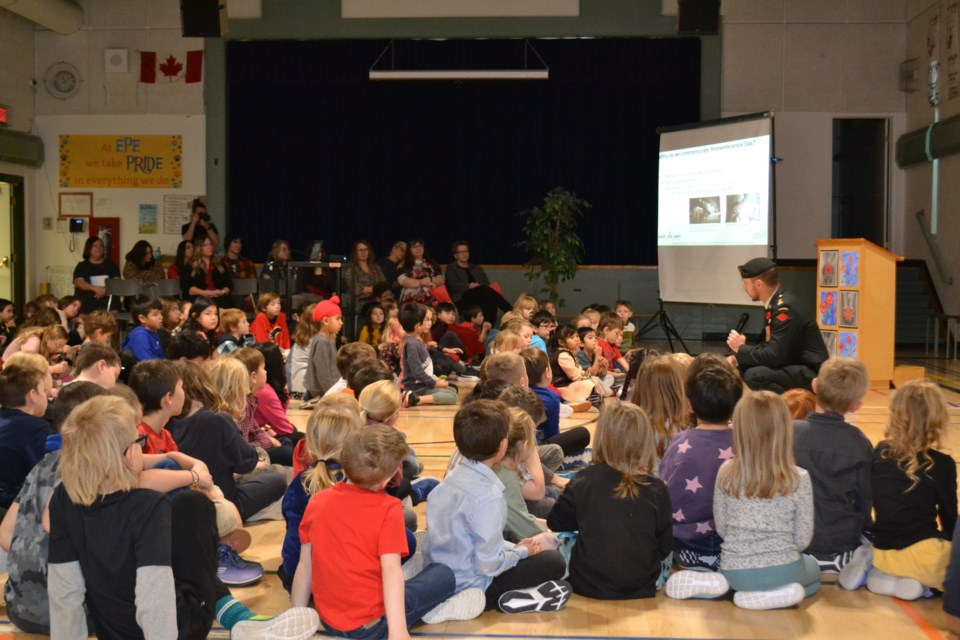 Major Jocelyn Roy of the Canadian Armed Forces got right down to the Elk Point Elementary School students’ level as he told them about his experiences in Afghanistan, Latvia and in Canada during his visit to this year’s Remembrance Day observances on Wednesday.