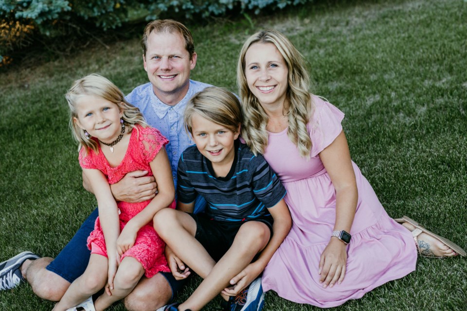 Angela Potts (right) is pictured with her husband Ryan, and kids Ethan and Brielle, shortly after Angela was diagnosed with breast cancer in 2022. 