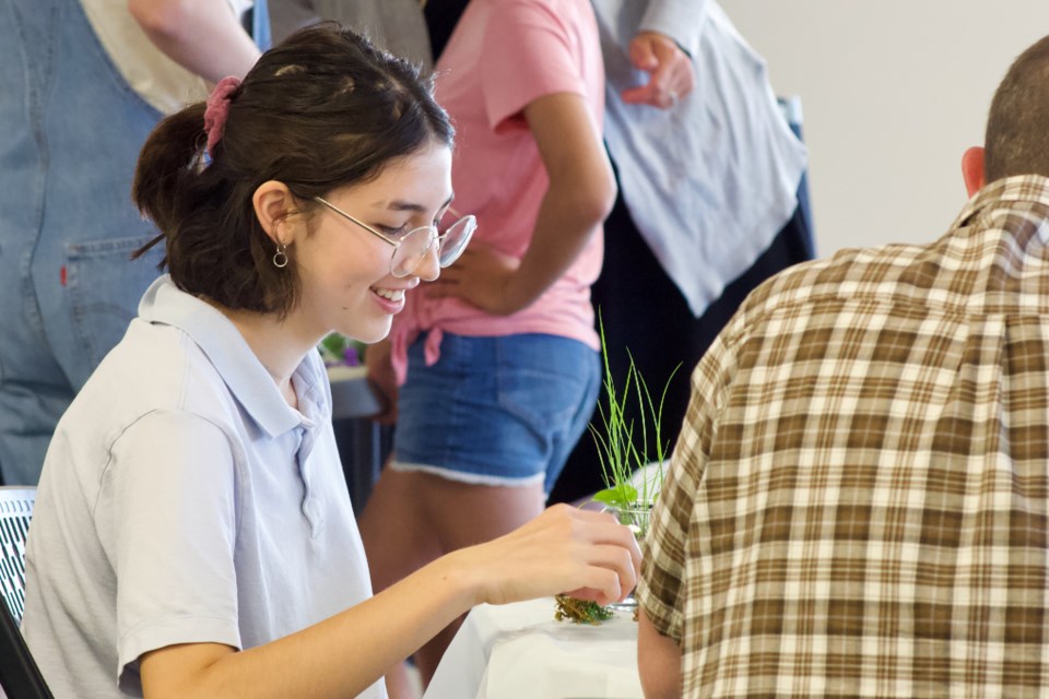 Over 30 teens and their guardians participated in an FCSS hands-on activity on July 27 building a mini- terrarium at McArthur Place. 