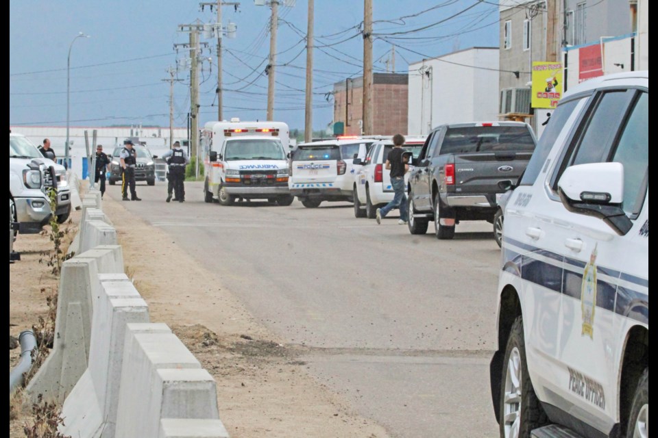 RCMP, peace officers, ambulance and fire crews responded to a downtown Lac La Biche medical call behind the Liquor Stop on Tuesday afternoon. Police blocked off a portion of the busy downtown back alley used by motorists as a detour while downtown construction continues.