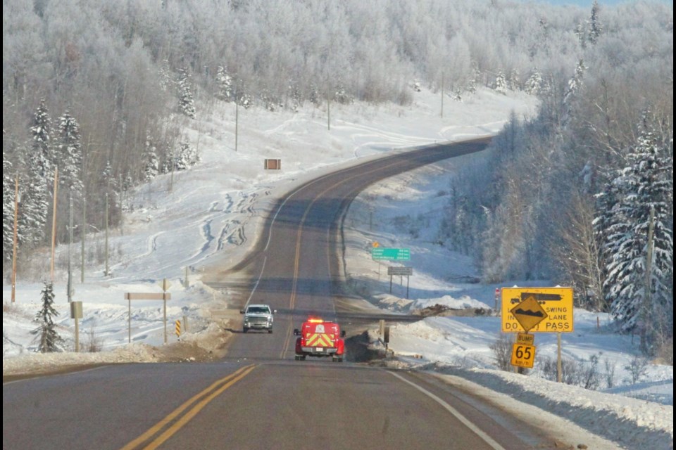 A Lac La Biche County rapid response fire truck heads north on Highway 881 to a recent emergency call. Fire crews logged about 200,000 kilometres on callouts last year.
