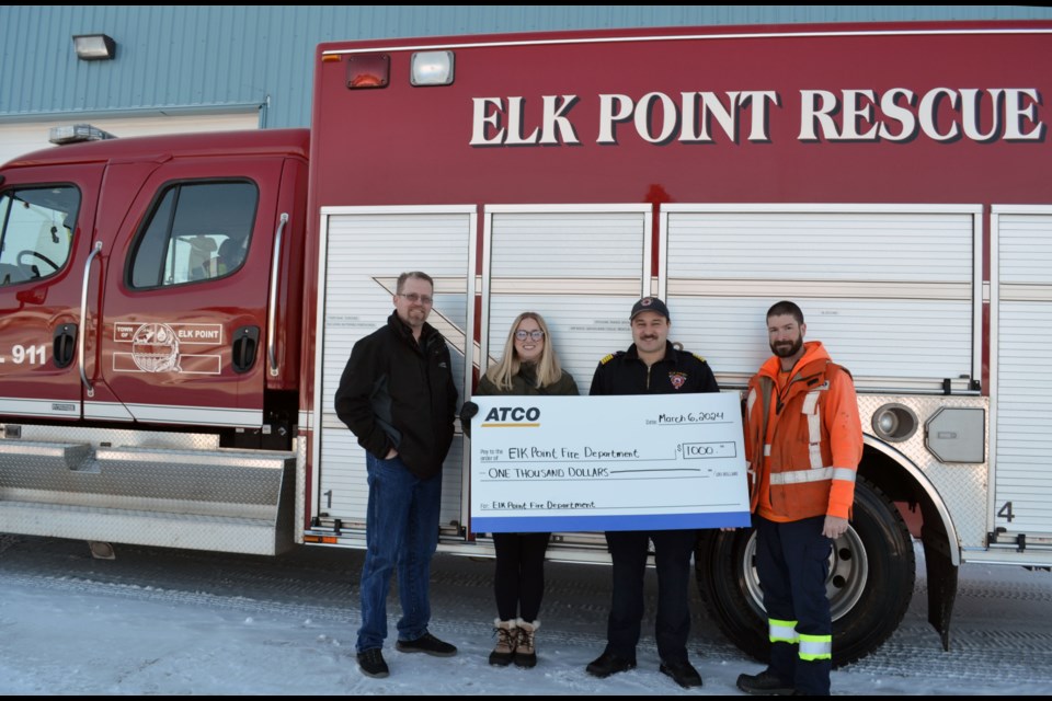 Elk Point Fire Chief Bryce Osinchuk accepted a $1,000 donation to the Fire Department’s equipment fund from Richelle Bourget and Don Gales of ATCO Electric as Fire Board chair Jason Boorse adds his thanks to ATCO.