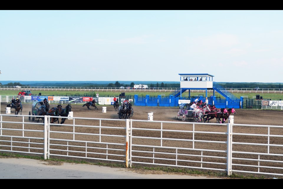 The world’s first female pro chuckwagon driver, Amber L’Heureux, left Kelly Morin, off the second barrel and Kris Flanagan, off the third, in the dust as she hit the track off the first barrel in the fifth heat of the Aug. 28 races, a lead she would maintain all the way around the oval to cross the finish line with a time of 1.22.49.