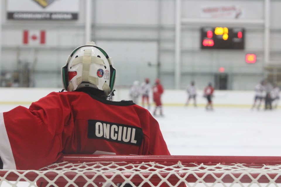 Comets' goalie Chase Onciul take a little break after turning away several shots during Friday night action at the Bold Center. Onciul helped to keep his team in the game during Friday night's 7-2 loss. Onciul's acrobatic style in the second and third periods kept dozens of Lac La Biche shots from finding the twine.