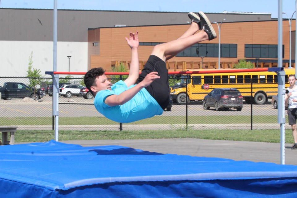 Student Gordon Reid clears the bar in the boys high jump at 1m50cm