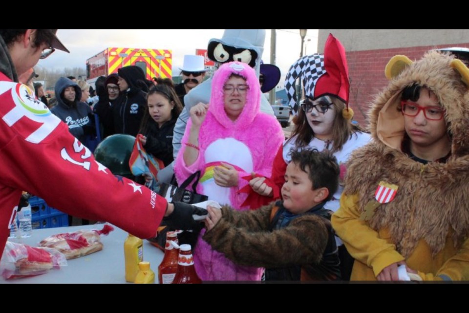 Crowds of costumed Halloween-ers filled the streets last year, coming to the Lac La Biche downtown for the customary community event featuring free hot dogs and hot chocolate served up by Junior B Clippers players and sponsored by LLB County.  This year may look different.     File Photo: Rob McKinley