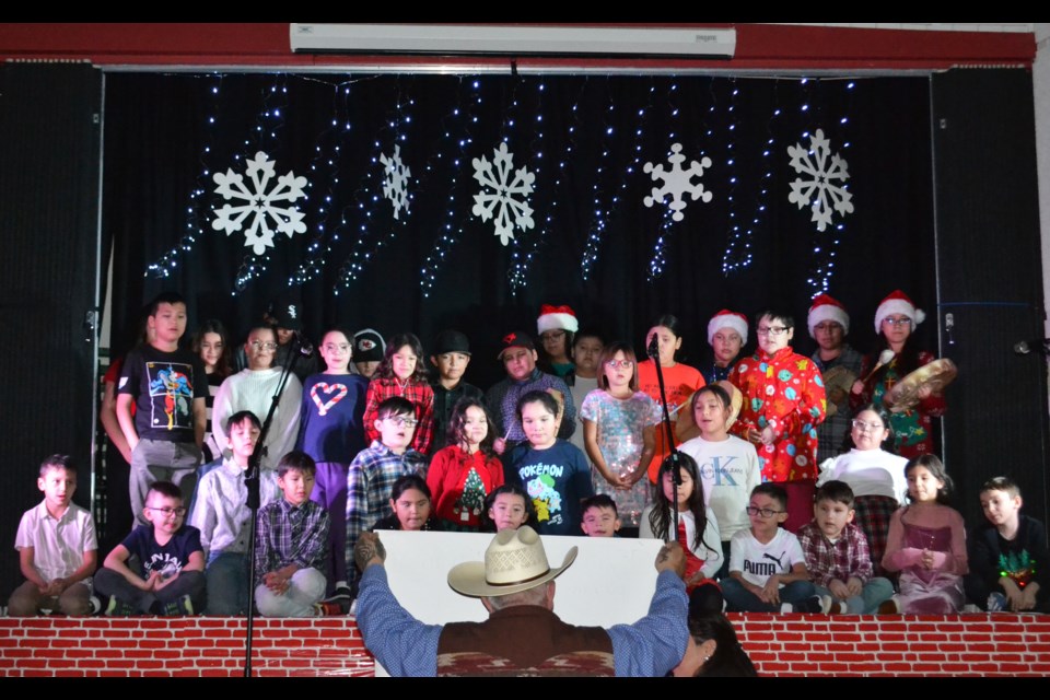 There were several drummer boys on the stage in the final performance at Heinsburg Community School’s Christmas program on Dec. 19, when all the school’s Cree classes joined forces to sing ‘Little Drummer Boy’ in Cree, accompanied by the traditional drums. St. Paul Education Regional Division board trustee and First Nations, Métis, Inuit (FNMI) advisor assisted as the script holder.