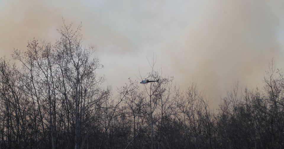 helicopter-flying-through-smoke