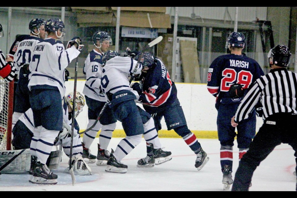 Following a failed attempt by the Voyageurs to get the puck into the Briercrest net in the Friday night game against Briercrest, flared tensions resulted in a brief skirmish.  The Voyageurs next play on October 27. Their next home game is November 3. Chris McGarry photo.