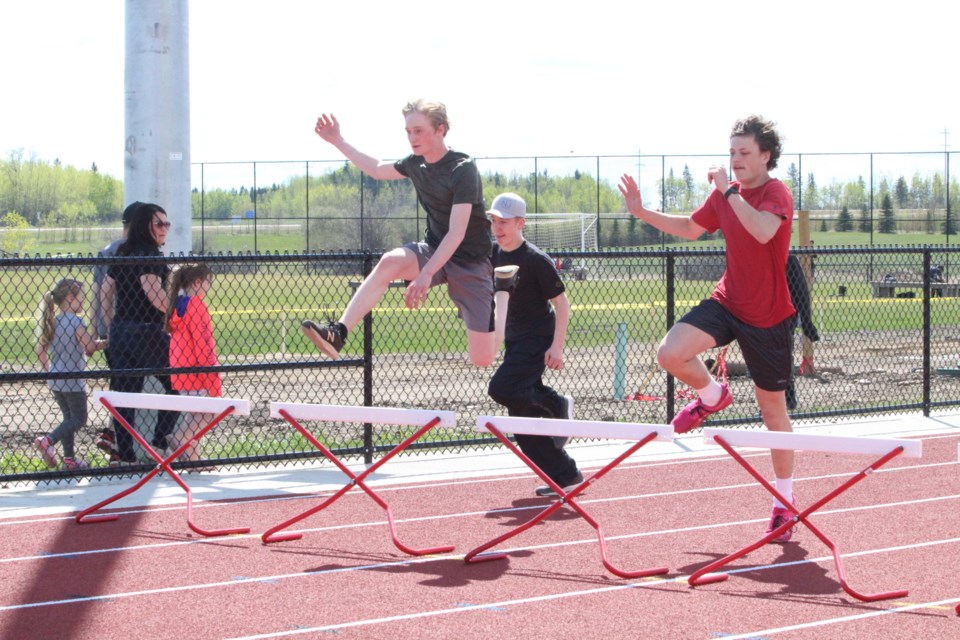 Ecole Beausejour's Finley Doody finished the 100 metre hurdles at the Bonnyville Districts in first place. Ecole Plamondon's Corvin Hayes was just four tenths of a second behind in third place.