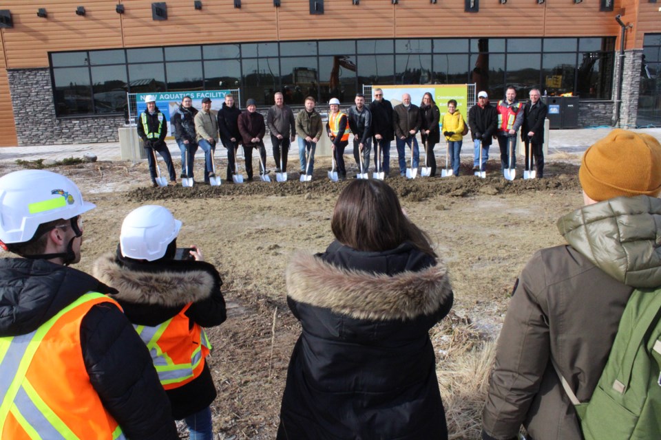 With silver shovels in hand a line of stakeholders involved with the new $46 million aquatic centre in Lac La Biche took part in a ground-breaking ceremony photo opp last week.