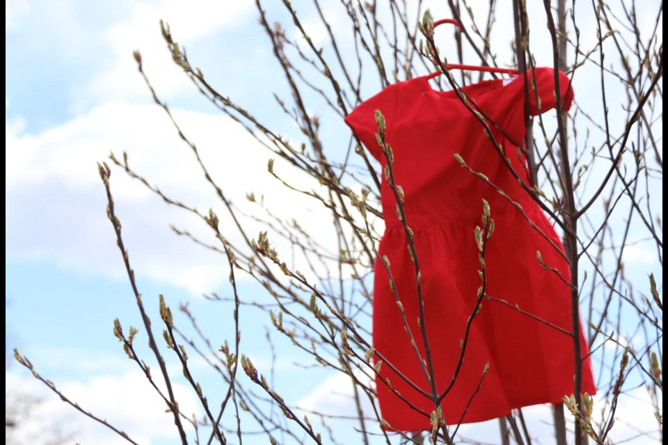 Red dresses were blowing in the breeze during the Missing and Murdered Indigenous Women and Girls event. 