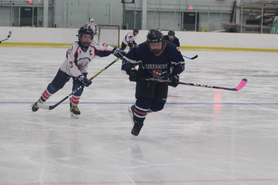 Clippers Pee Wee captain Eric Andreshewski chases a Kitscoty player.
