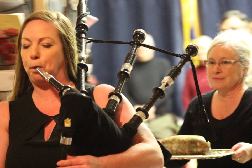 Molly Fyten pipes in the haggis, carried on a silver platter by her mom Ruth, at last year's Robbie Burns Day dinner at the Lac La Biche Legion.     File Rob McKinley