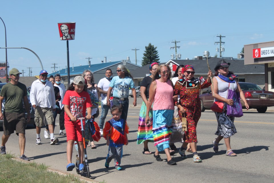 Walk of Awareness led by Anita Large of Saddle Lake Cree Nation to the St. Paul Registry office Thursday.