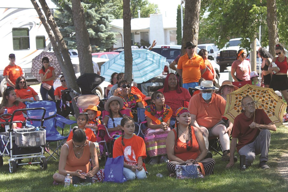 Area families gathered in the shade at the UFO Landing Pad in St. Paul on July 1 for the Rally for The 1323+ For Those That Never Made It Home. Organizers of the afternoon event extended an open invitation to residential school survivors and anyone with who wished to speak to the discovery of unmarked graves at former residential school sites to address the crowd gathered in tribute beneath the sweltering afternoon sun.