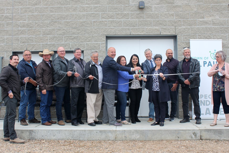 Enjoying the moment - It was a celebratory mood at the official opening of St. Paul's new wastewater treatment plant on Friday. Pictured left to right: St. Paul CAO Steven Jeffery, County of St. Paul councillors Darrell Younghans and Kevin Wirsta, Director of Utilities Bert Pruneau, town councillors Gary Ward and Ron Boisvert, MLA Dave Hanson, MP Shannon Stubbs, Transportation Minister Rajan Sawhney, Reeve Steve Upham, Mayor Maureen Miller, town councillor Brad Eamon, Elk Point Mayor Lorne Young and outgoing CAO Kim Heyman.