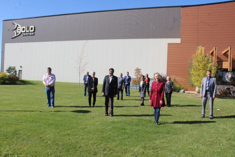 Lac La Biche County Mayor Omer Moghrabi, MLA Laila Goodridge, Infrastructure Minister Prasad Panda and Portage College vice president Bev Moghrabi along with Lac La Biche County councillors stand where a new 30,000 square foot aquatic centre will soon be constructed.          Image: Rob McKinley