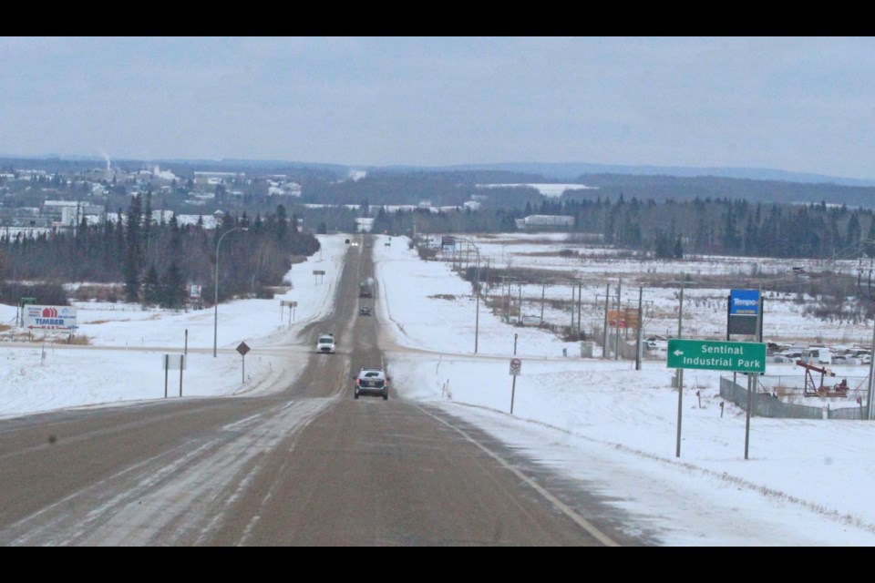Vehicles travel down Highway 55 towards the intersection to the Sentinel Industrial Park and the adjacent industrial subdivision. A constultant working for the developers of a new gas station project and the municipality says $800,000 needs to be spent to make the intersection safe.