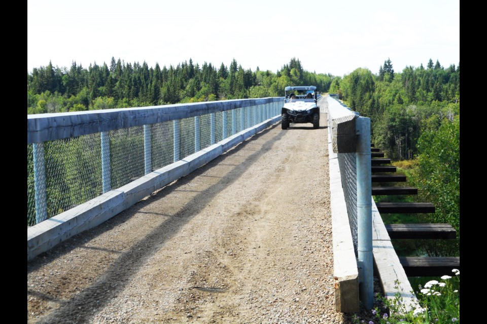Vicki Brooker photo
The Beaver River Trestle is one of the outstanding attractions along the Iron Horse Trail, providing magnificent panoramic views of the Beaver River valley southwest of Cold Lake for these travellers, who came from Lacombe to enjoy a trail riding adventure.
