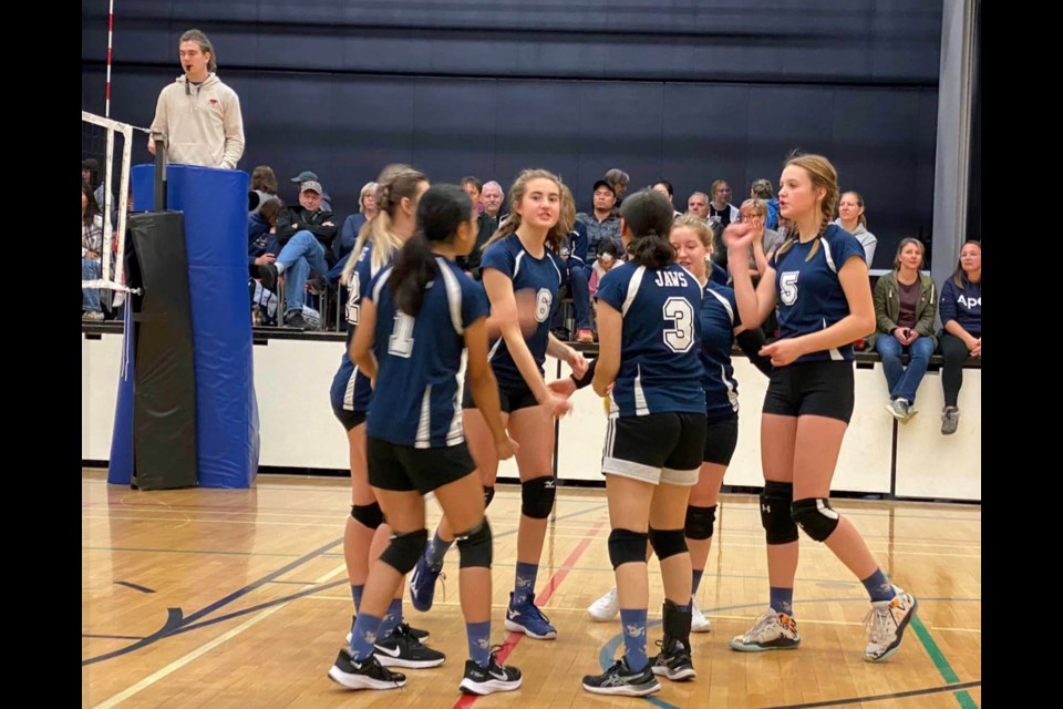 The JAWS junior girls celebrate a point on their way to a second place finish at the Cold Lake tourney.