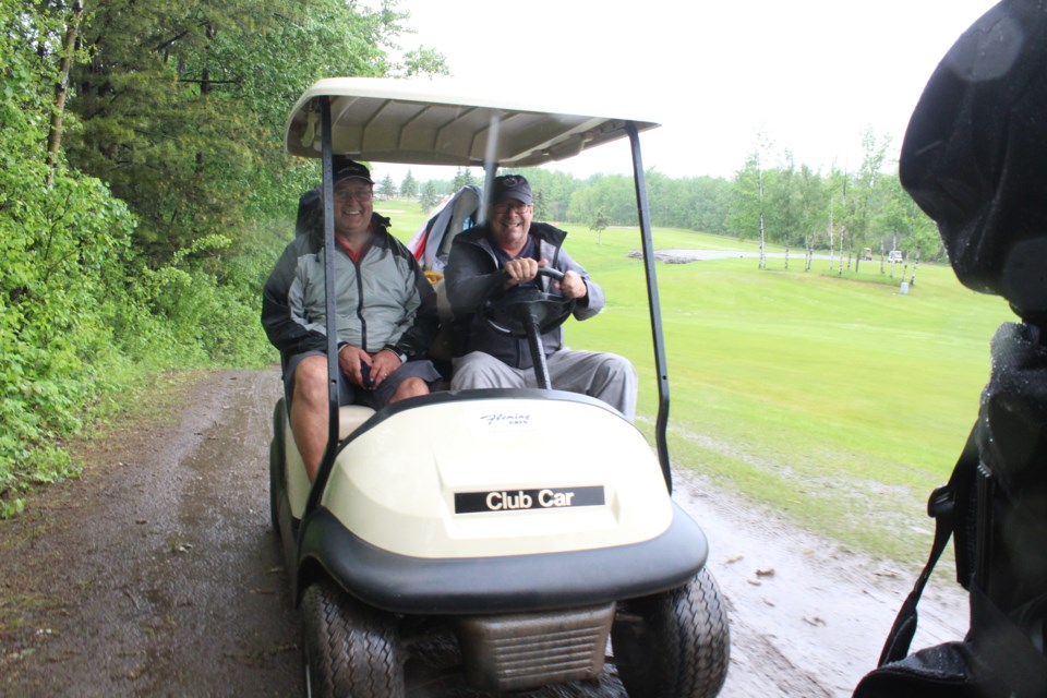 jimmy-and-rod-in-the-cart-golf-kinsmen